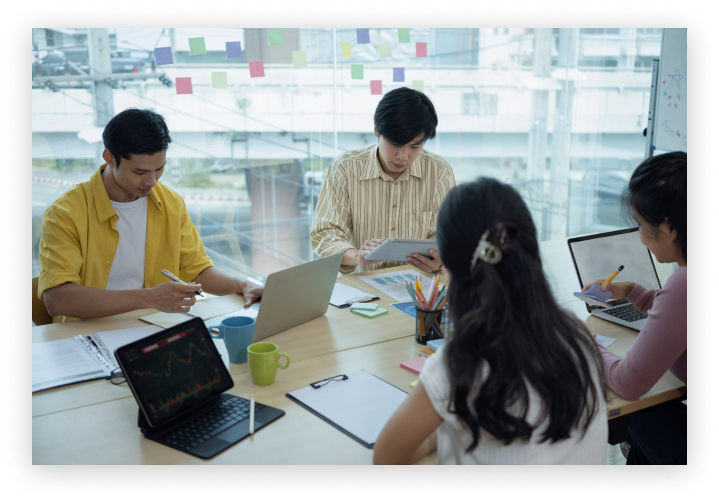 Young IT development team working on a project.